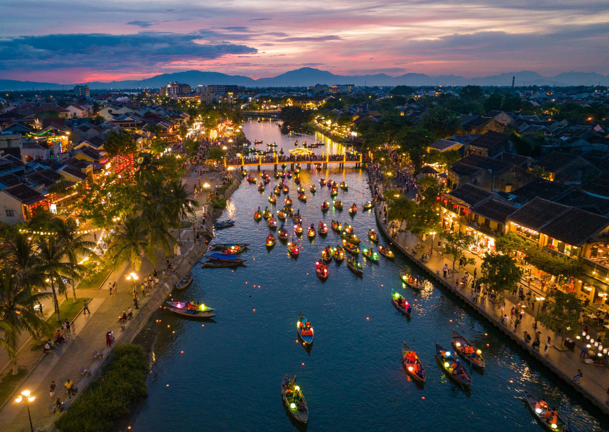 Experience a boat trip on the Hoai River.