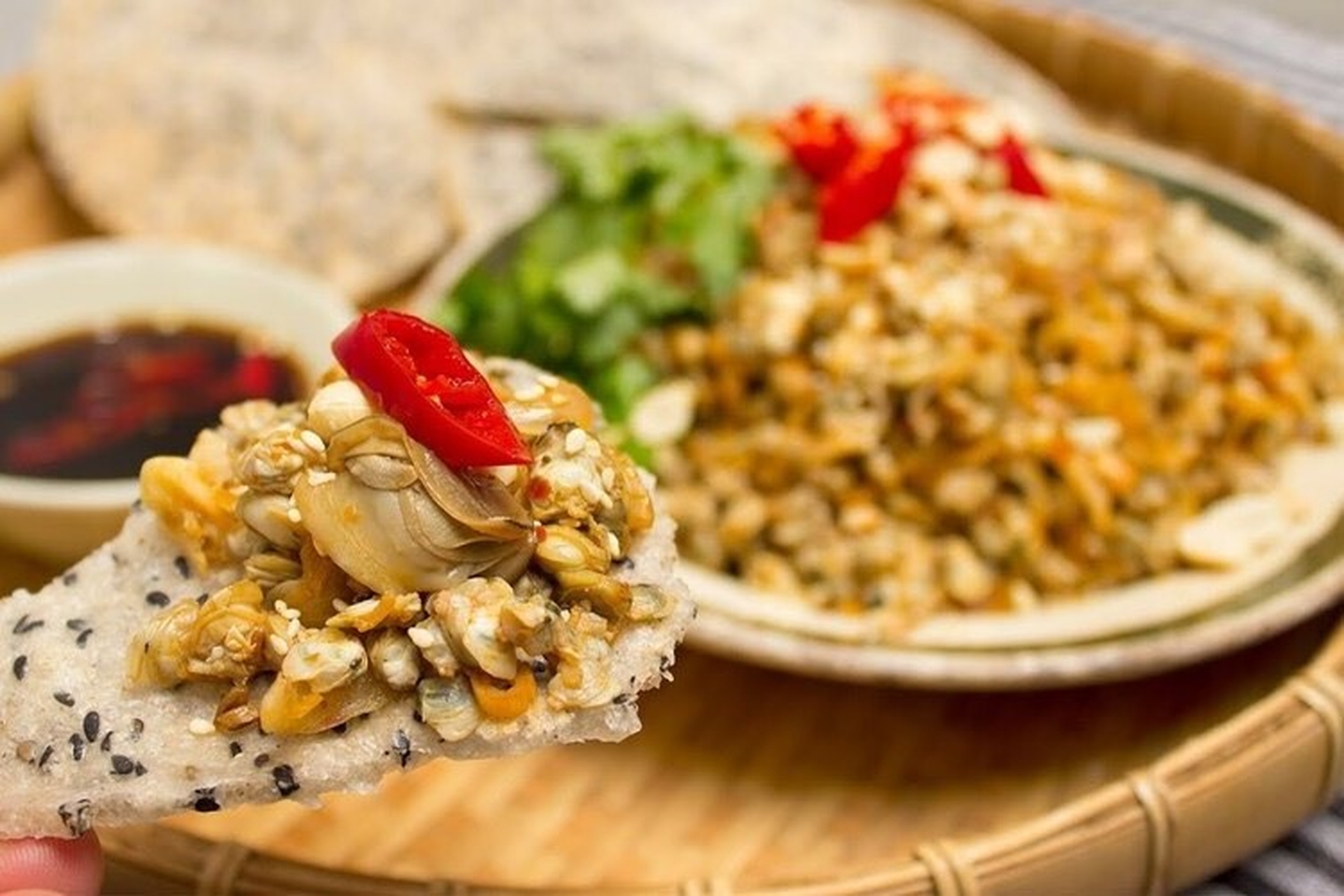 fried mussel cake, rustic dish, rich in central flavor